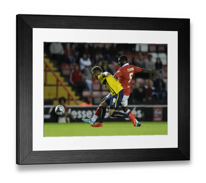 Framed Print : Bristol City vs Oxford United: Karleigh Osborne Tackles Carlton Morris in First Round Capital One Cup Clash Framed Print : Bristol City vs Oxford United: Karleigh Osborne Tackles Carlton Morris in First Round Capital One Cup Clash