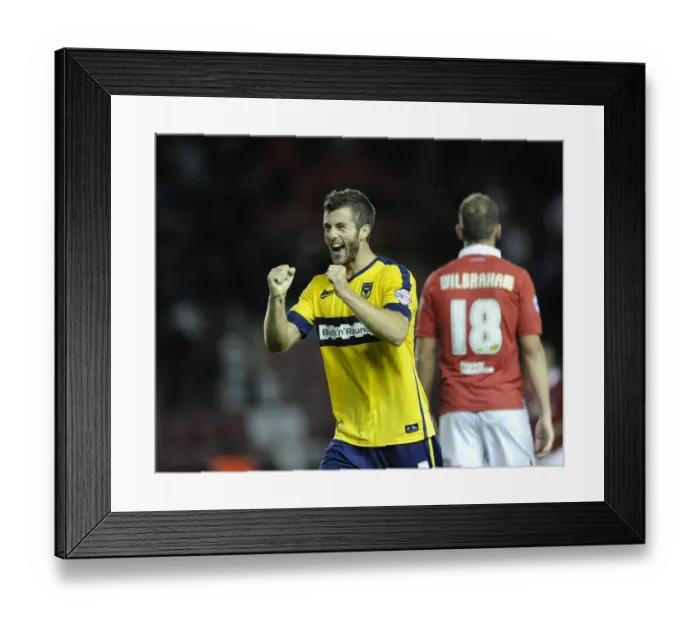 Framed Print : Oxford United Celebrate Upset Win Against Bristol City in Capital One Cup