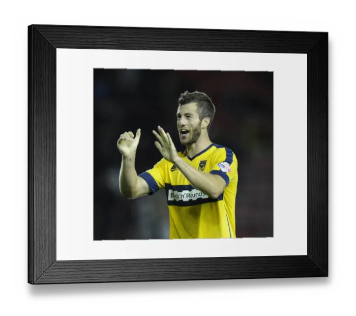 Framed Print : Celebrating the Upset: Oxford United's Jonathan Meades Rejoices after Defeating Bristol City in the Capital One Cup Framed Print : Celebrating the Upset: Oxford United's Jonathan Meades Rejoices after Defeating Bristol City in the Capital One Cup