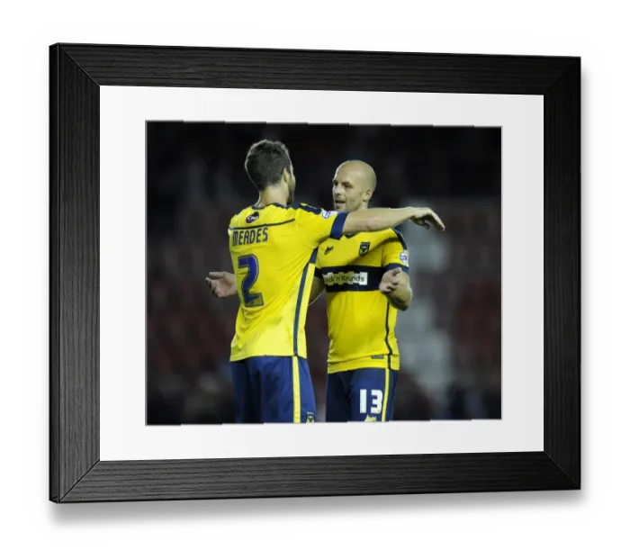 Framed Print : Celebrating Victory: Oxford United's Hunt and Meades Rejoice After Upset Win Against Bristol City Framed Print : Celebrating Victory: Oxford United's Hunt and Meades Rejoice After Upset Win Against Bristol City