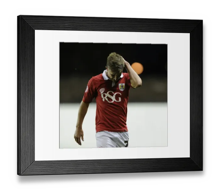 Framed Print : Bristol City's Joe Bryan in Pain: Injury Sidelines Star Player Against Oxford United Framed Print : Bristol City's Joe Bryan in Pain: Injury Sidelines Star Player Against Oxford United