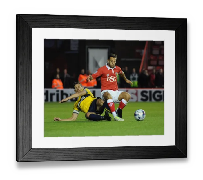Framed Print : Bristol City vs Oxford United: Intense Battle for Control - Football Rivalry at Ashton Gate Framed Print : Bristol City vs Oxford United: Intense Battle for Control - Football Rivalry at Ashton Gate
