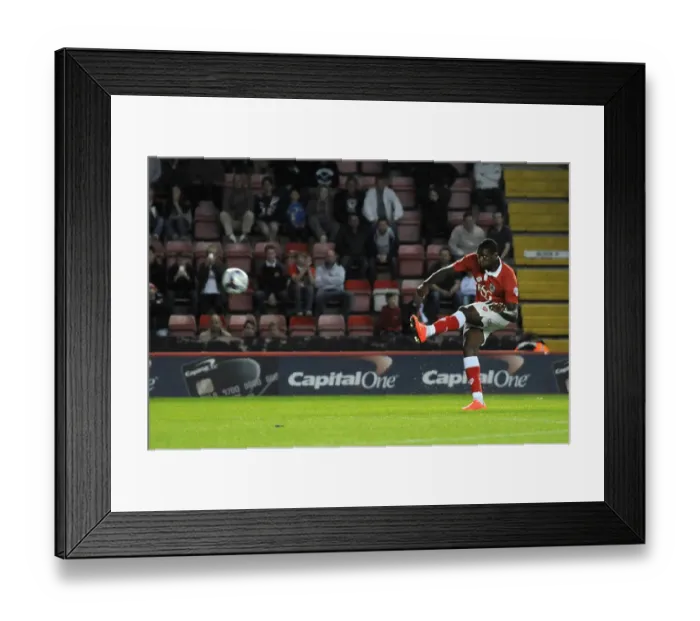 Framed Print : Bristol City's Jay Emmanuel-Thomas Aims for the Net against Oxford United Framed Print : Bristol City's Jay Emmanuel-Thomas Aims for the Net against Oxford United