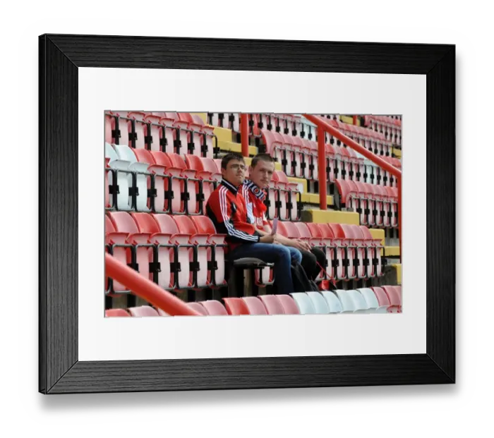 Framed Print : Intense Focus: The Determination of Bristol City Fans at Ashton Gate
