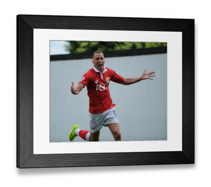 Framed Print : Thrilling Moment: Aaron Wilbraham's Goal Celebration for Bristol City in Sky Bet League One Match against Colchester United, 2014