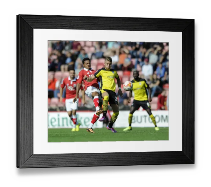 Framed Print : Bristol City's Korey Smith Closes In on Colchester United's George Moncur in Intense Football Action Framed Print : Bristol City's Korey Smith Closes In on Colchester United's George Moncur in Intense Football Action