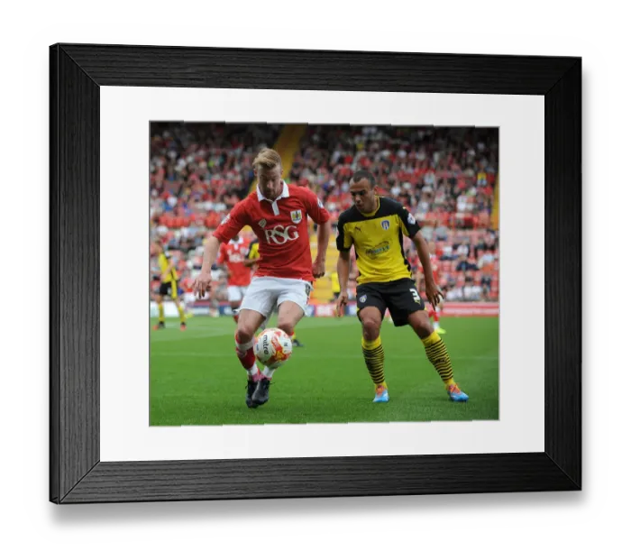 Framed Print : Bristol City's Wade Elliott Chased Down by Colchester United's Ben Gordon during Sky Bet League One Match