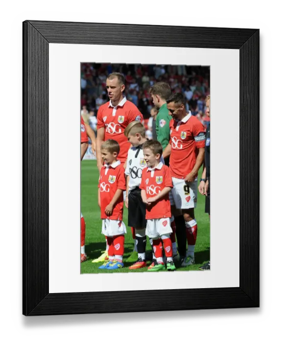 Framed Print : Bristol City's Sam Baldock Meets Mascots During Sky Bet League One Clash Against Colchester United
