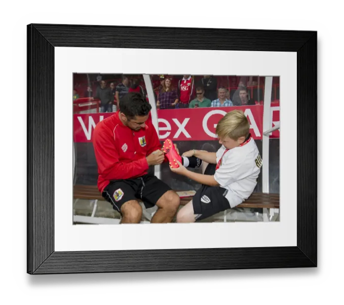 Framed Print : Bristol City's Scott Murray Signs Young Fan's Football Boot at Ashton Gate Framed Print : Bristol City's Scott Murray Signs Young Fan's Football Boot at Ashton Gate