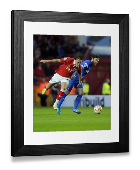 Framed Print : Bristol City's Luke Ayling Dodges Challenge from Leyton Orient's Romain Vincelot during Sky Bet League One Match