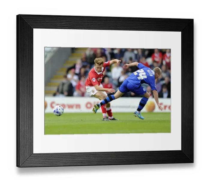 Framed Print : Bristol City's Luke Freeman Evades Rochdale's Jamie Allen during Sky Bet League One Clash