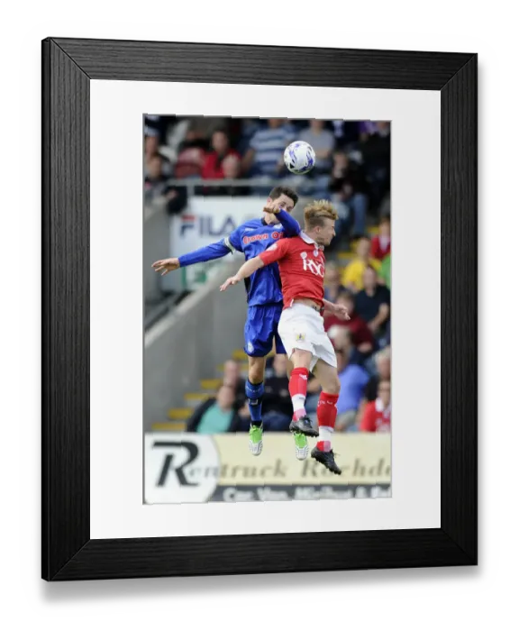 Framed Print : Ian Henderson Clashes Heads with Wade Elliott in Rochdale vs. Bristol City Football Match, 2014 Framed Print : Ian Henderson Clashes Heads with Wade Elliott in Rochdale vs. Bristol City Football Match, 2014