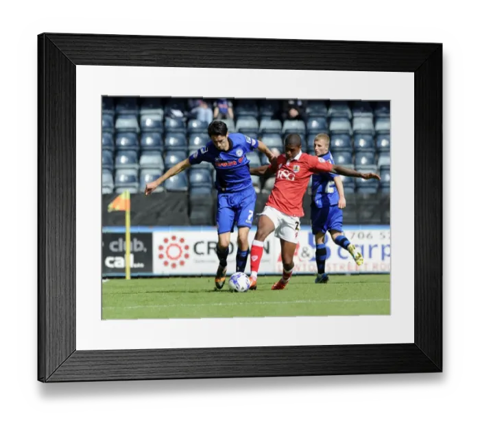 Framed Print : Bristol City's Mark Little and Rochdale's Peter Vincenti Battle for Ball Possession in Sky Bet League One Clash Framed Print : Bristol City's Mark Little and Rochdale's Peter Vincenti Battle for Ball Possession in Sky Bet League One Clash