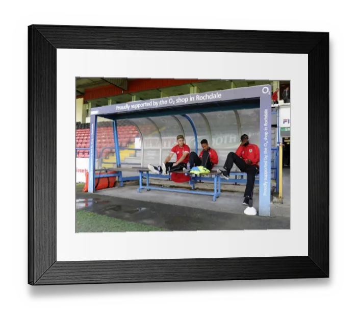 Framed Print : Bristol City Footballers Wes Burns, Bobby Reid, and Karleigh Osborne on the Bench at Rochdale's Spotland Stadium during Sky Bet League One Match
