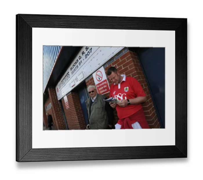 Framed Print : Fan Perusing Programme Outside Spotland Stadium - Rochdale vs. Bristol City Football Match, 2014 Framed Print : Fan Perusing Programme Outside Spotland Stadium - Rochdale vs. Bristol City Football Match, 2014