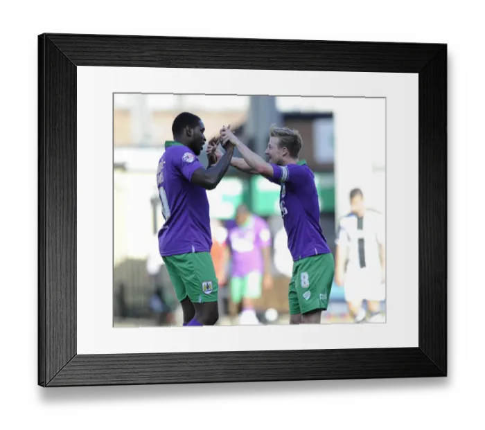 Framed Print : Last-Minute Drama: Elliott and Emmanuel-Thomas Celebrate Thrilling Victory for Bristol City over Notts County Framed Print : Last-Minute Drama: Elliott and Emmanuel-Thomas Celebrate Thrilling Victory for Bristol City over Notts County