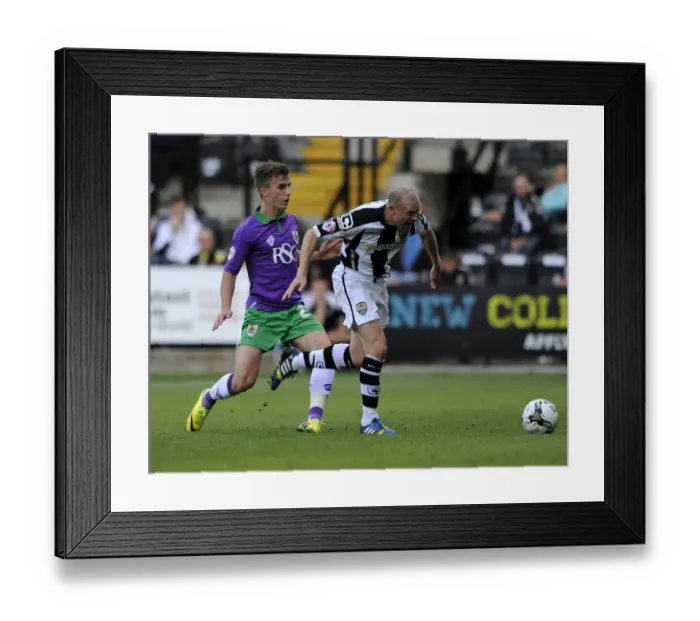 Framed Print : Bristol City's Joe Bryan Faces Off Against Notts County's Gary Jones in Sky Bet League One Clash Framed Print : Bristol City's Joe Bryan Faces Off Against Notts County's Gary Jones in Sky Bet League One Clash