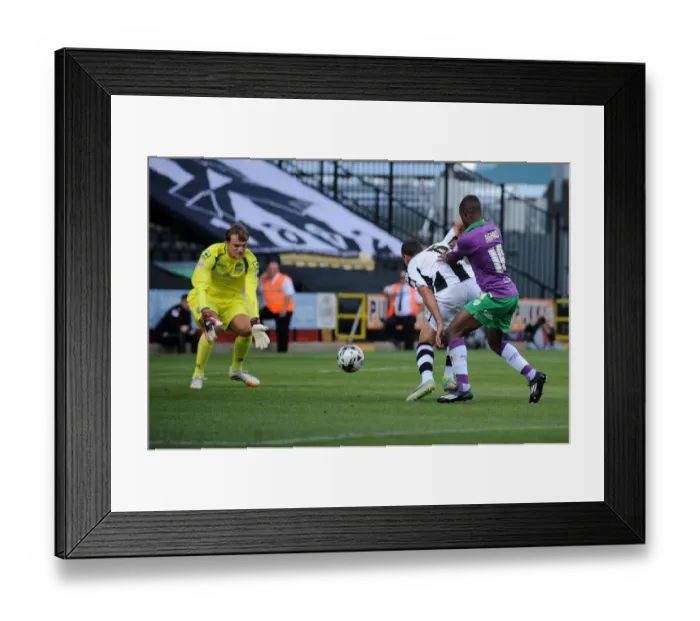 Framed Print : Determined Kieran Agard Chases Down the Ball Despite Head Injury in Notts County vs. Bristol City Match Framed Print : Determined Kieran Agard Chases Down the Ball Despite Head Injury in Notts County vs. Bristol City Match