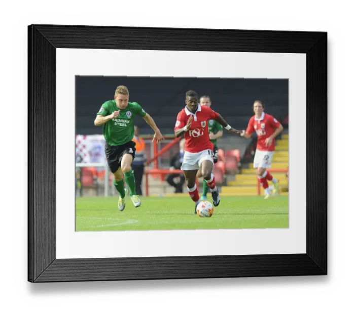 Framed Print : Kieran Agard Dashes Past Andy Dawson: Intense Moment from Bristol City vs Scunthorpe United, Sky Bet League One
