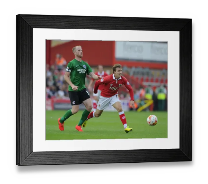 Framed Print : Battling for the Ball: Luke Freeman vs Neil Bishop - Football Rivalry at Ashton Gate Framed Print : Battling for the Ball: Luke Freeman vs Neil Bishop - Football Rivalry at Ashton Gate