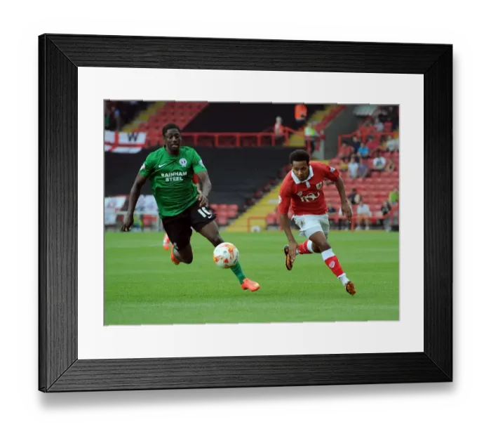 Framed Print : Bristol City vs Scunthorpe United: A Football Rivalry - Intense Moment between Korey Smith and Hakeeb Adelakun