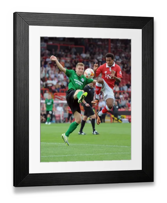 Framed Print : Intense Rivalry: Korey Smith vs. Andy Dawson - Bristol City vs. Scunthorpe United Framed Print : Intense Rivalry: Korey Smith vs. Andy Dawson - Bristol City vs. Scunthorpe United