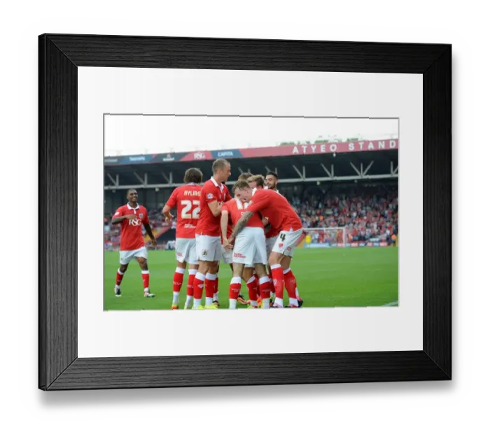 Framed Print : Bristol City: Triumphant Moment as Players Celebrate Victory Over Scunthorpe United, September 6, 2014
