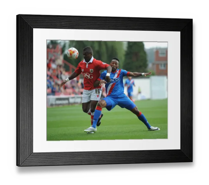 Framed Print : Intense Rivalry: Agard and Bennett Clash in Bristol City vs Doncaster Rovers Football Match, September 2014