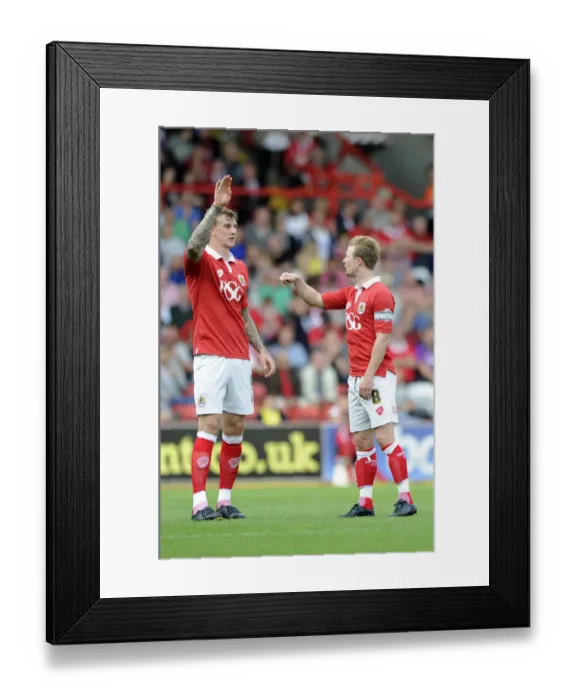 Framed Print : Bristol City Rivalry: Aden Flint and Wade Elliott's Heated On-Field Exchange