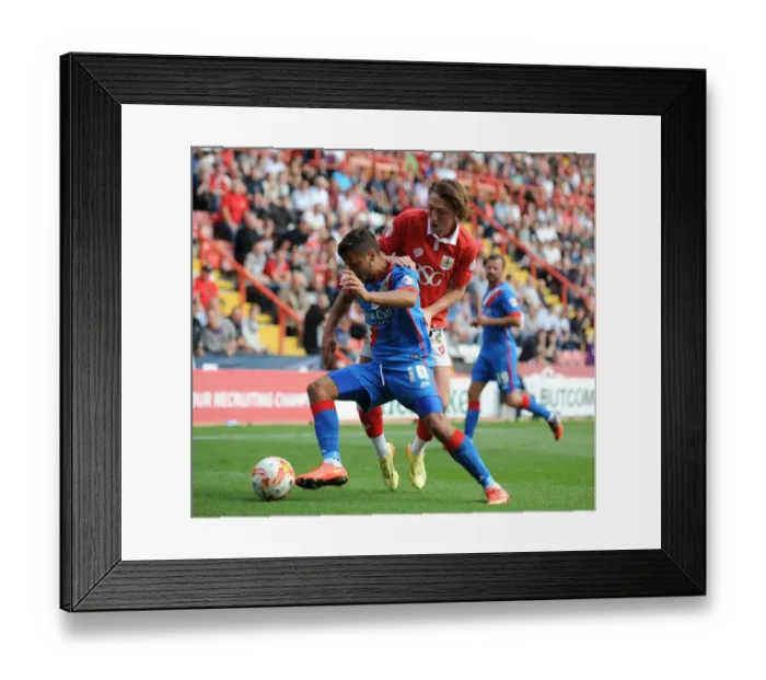 Framed Print : Luke Ayling's Intense Moment: Closing In on Doncaster Rovers Harry Forrester