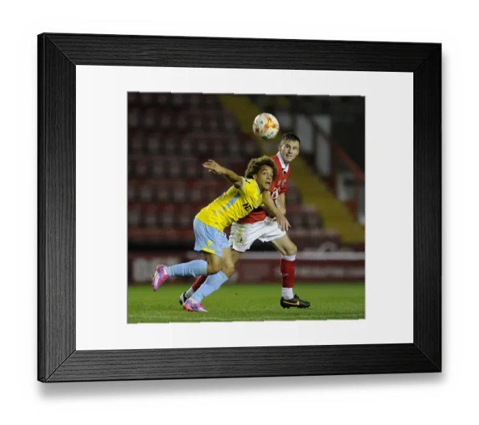 Framed Print : Clash on the Pitch: Murphy vs Allassani - A Football Rivalry Unfolds at Ashton Gate (Bristol City U21s vs Crystal Palace U21s)
