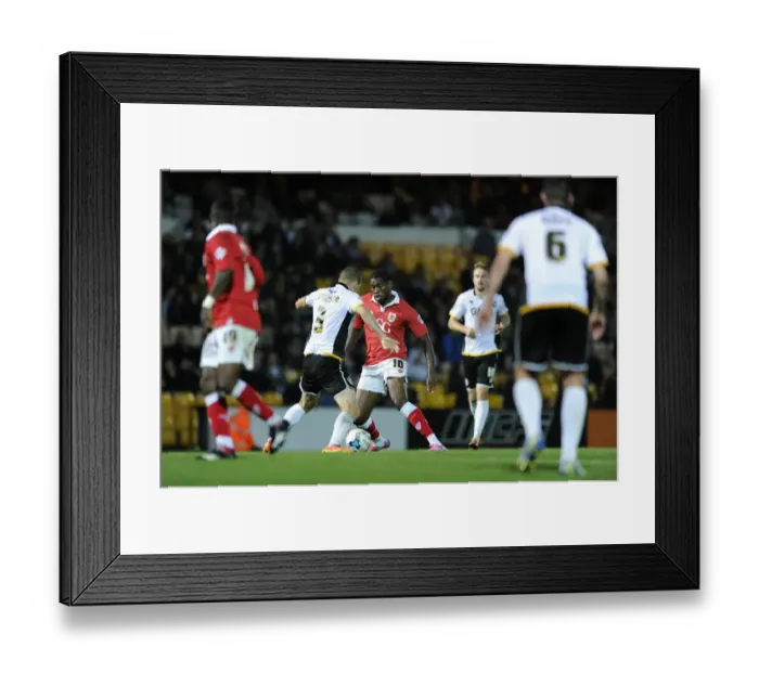 Framed Print : Jay Emmanuel-Thomas vs Carl Dickinson: Intense Moment in Port Vale vs Bristol City Football Match, September 16, 2014 Framed Print : Jay Emmanuel-Thomas vs Carl Dickinson: Intense Moment in Port Vale vs Bristol City Football Match, September 16, 2014