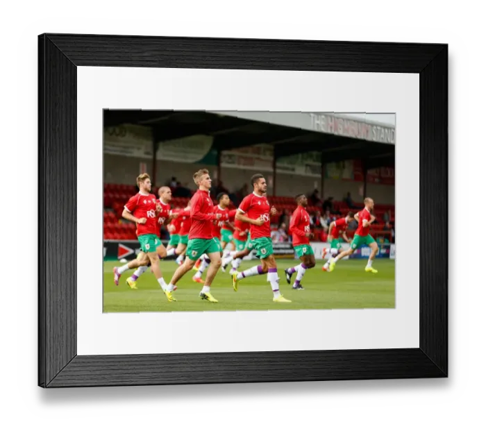 Framed Print : Bristol City Football Club Players Warm Up Ahead of Fleetwood Town Match, 2014