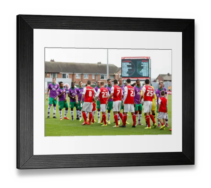Framed Print : Bristol City Players Greet Fleetwood Town Opponents during Sky Bet League 1 Match, 2014