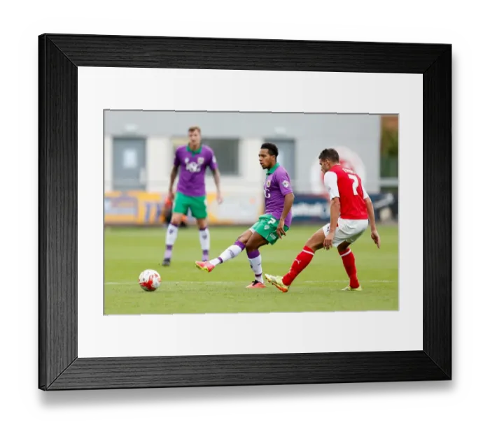 Framed Print : Korey Smith vs Gareth Evans: Intense Moment in Fleetwood Town vs Bristol City Football Match, 2014