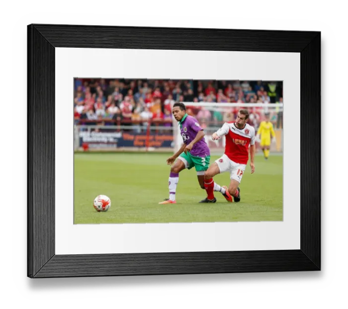 Framed Print : Korey Smith vs Matty Blair: Intense Moment in Fleetwood Town vs Bristol City Football Match, 2014