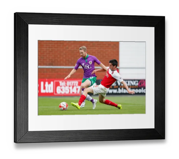 Framed Print : Bristol City's Scott Wagstaff Tackled by Fleetwood's Stephen Jordan during Fleetwood Town vs. Bristol City, Sky Bet League 1, 2014