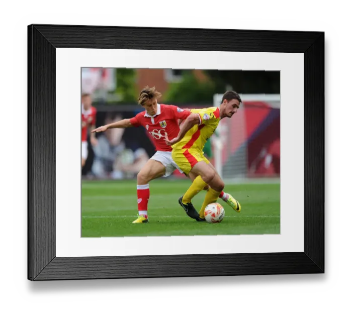 Framed Print : Bristol City vs MK Dons: Intense Moment as Luke Freeman Faces Off Against Darren Potter Framed Print : Bristol City vs MK Dons: Intense Moment as Luke Freeman Faces Off Against Darren Potter