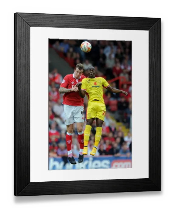 Framed Print : Clash at Ashton Gate: Aden Flint vs Benik Afobe