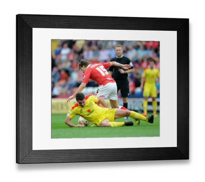 Framed Print : Bristol City vs MK Dons: Luke Freeman vs Darren Potter Clash in Sky Bet League One Framed Print : Bristol City vs MK Dons: Luke Freeman vs Darren Potter Clash in Sky Bet League One