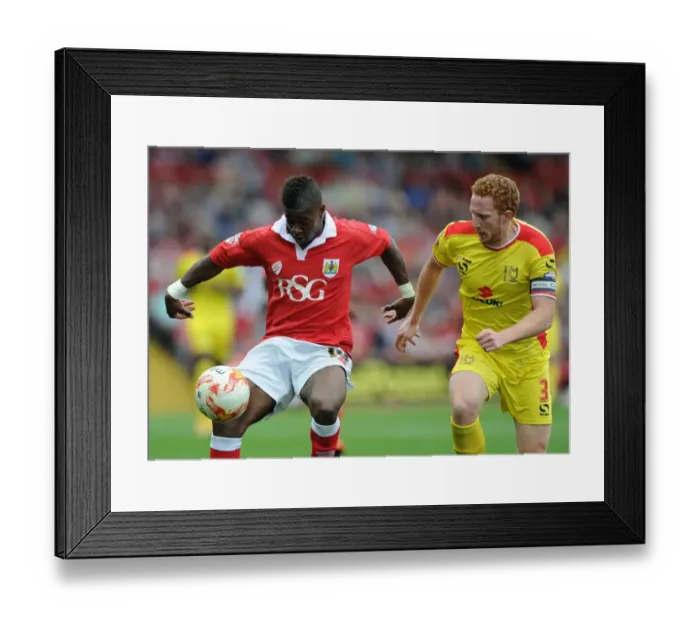 Framed Print : Bristol City vs MK Dons: Intense Battle for the Ball - Football Rivalry at Ashton Gate Framed Print : Bristol City vs MK Dons: Intense Battle for the Ball - Football Rivalry at Ashton Gate