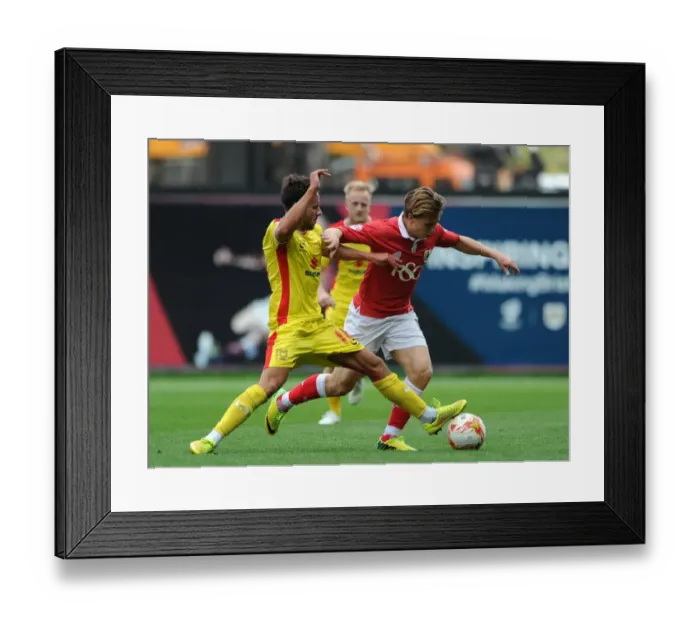 Framed Print : Bristol City vs MK Dons: Luke Freeman vs George Baldock Clash in Sky Bet League One Framed Print : Bristol City vs MK Dons: Luke Freeman vs George Baldock Clash in Sky Bet League One