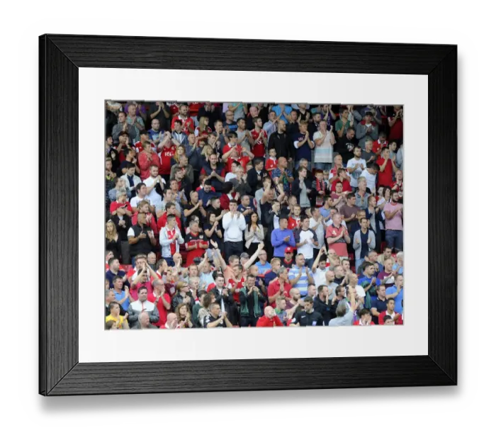 Framed Print : Bristol City Fans Honor Mark Saunders with Minutes Applause during Bristol City v MK Dons Match Framed Print : Bristol City Fans Honor Mark Saunders with Minutes Applause during Bristol City v MK Dons Match