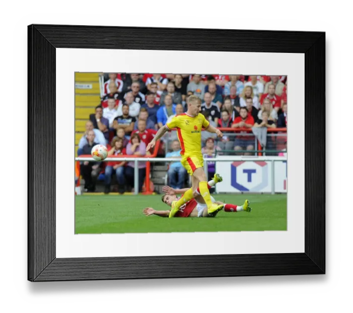 Framed Print : Bristol City vs MK Dons: Joe Bryan Tackles Kyle McFadzean in Sky Bet League One Clash