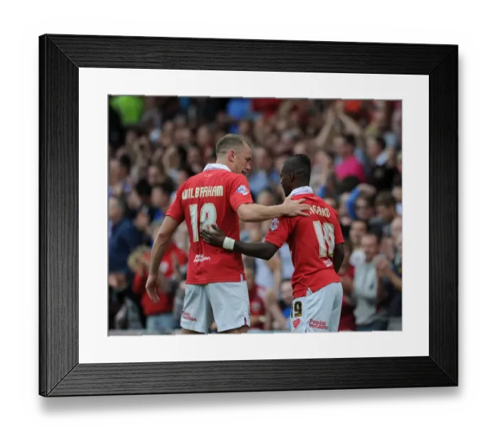 Framed Print : Celebration at Ashton Gate: Agard and Wilbraham Rejoice in Bristol City's Win over MK Dons