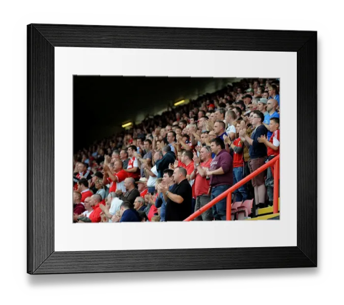 Framed Print : Passionate Bristol City Fans in Full Force at Ashton Gate during Sky Bet League One Match against MK Dons