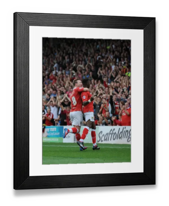 Framed Print : Celebration at Ashton Gate: Agard and Elliott Rejoice in Bristol City's Victory over MK Dons Framed Print : Celebration at Ashton Gate: Agard and Elliott Rejoice in Bristol City's Victory over MK Dons