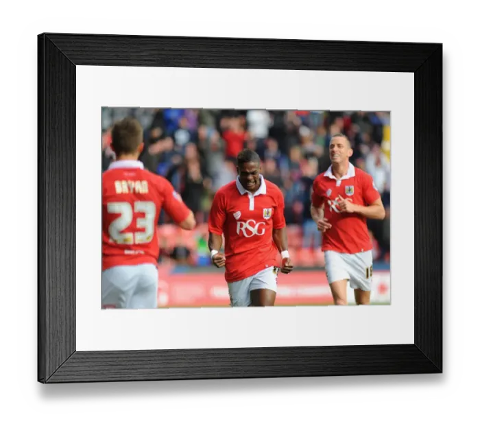 Framed Print : Bristol City's Kieran Agard Rejoices in Chesterfield's Ian Evatt's Own Goal Framed Print : Bristol City's Kieran Agard Rejoices in Chesterfield's Ian Evatt's Own Goal