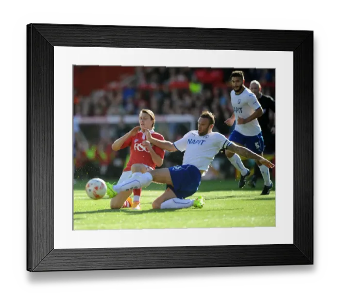 Framed Print : Bristol City vs Chesterfield: Luke Freeman Tackled by Ian Evatt