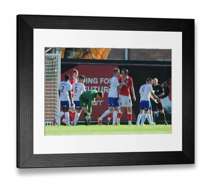 Framed Print : Bristol City vs Chesterfield: Intense Moment Between Luke Ayling and Sam Clucas